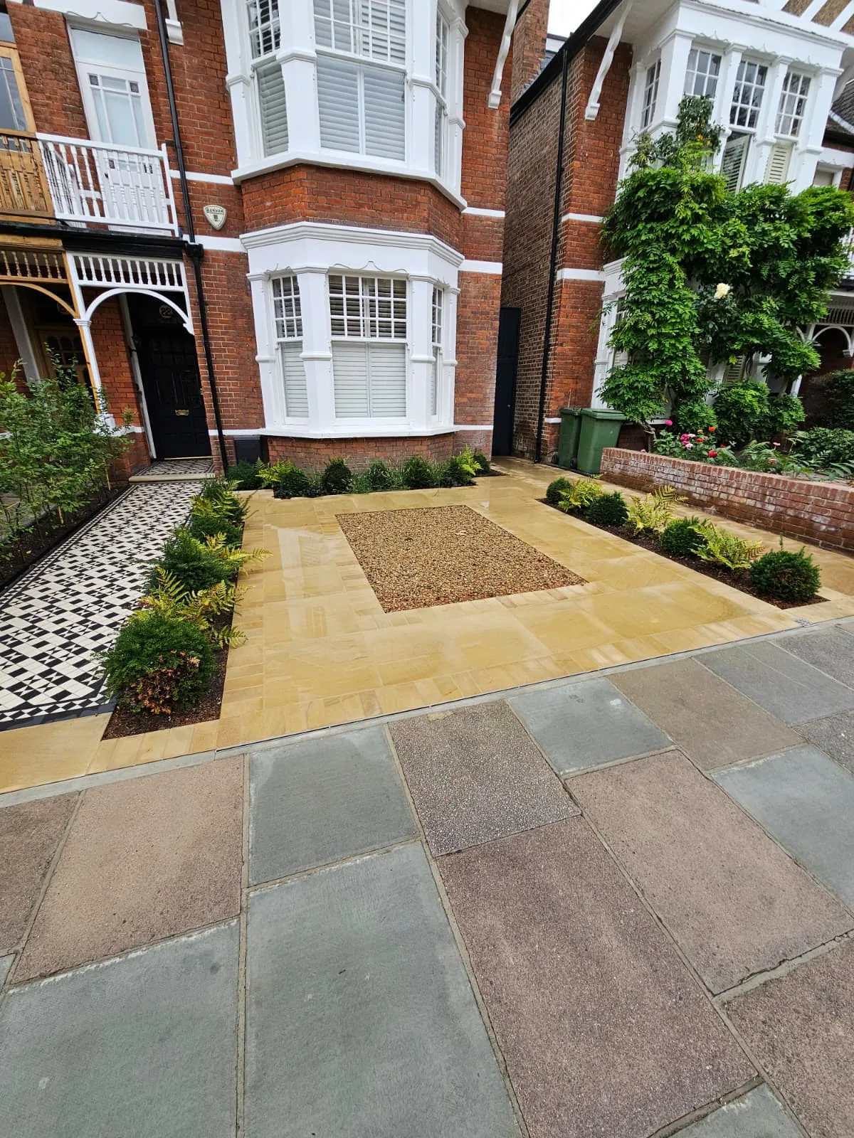 Natural stone patio installation by Botanic Hardscapes