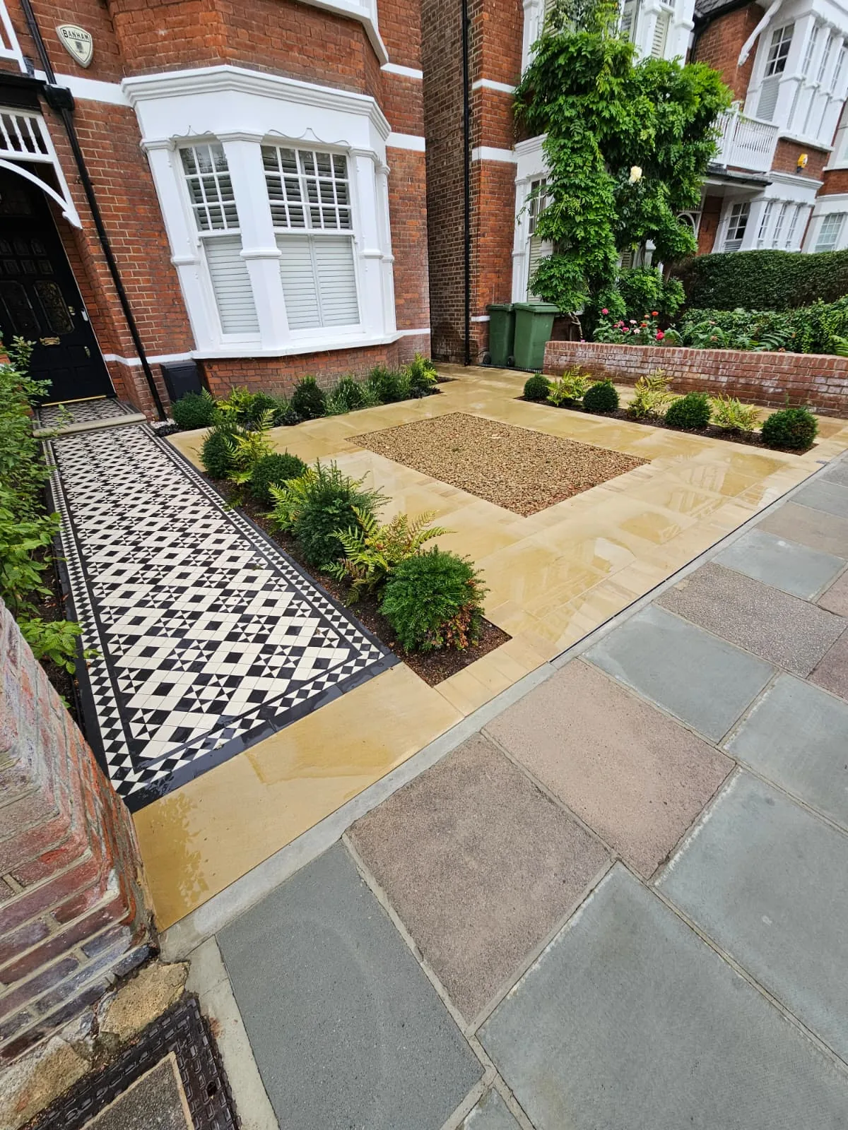 Sandstone driveway with Victorian tile mosaic in West London