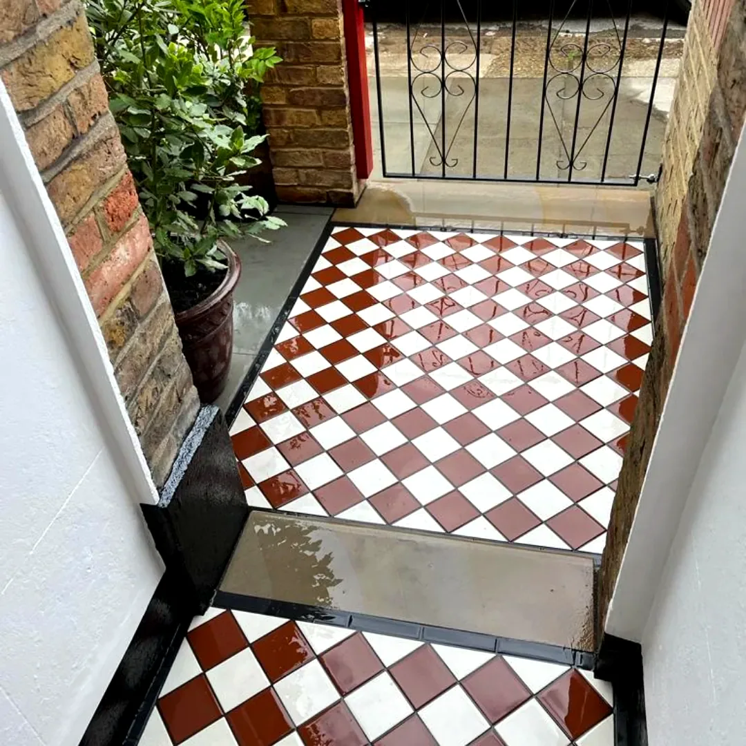 Red and white Victorian tiled pathway