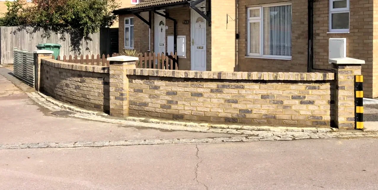 Curved brick wall in front garden