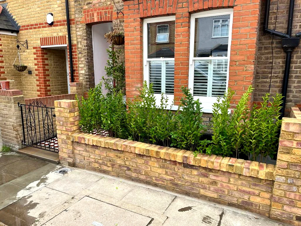 London brick wall with built-in planter
